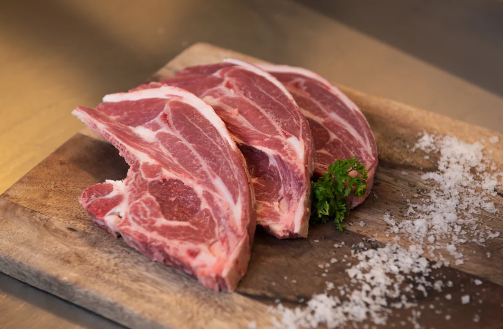 Close up of quality raw lamb steaks.