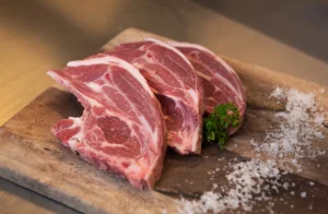 Close up of quality raw lamb steaks.